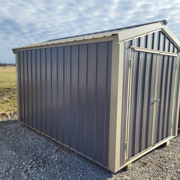 Metal shed in open field