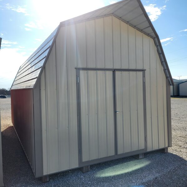 Metal storage shed under bright sky
