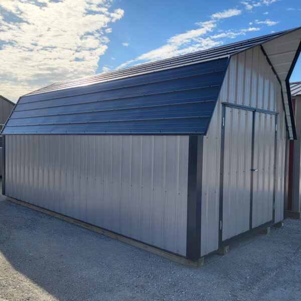 Metal storage shed under blue sky