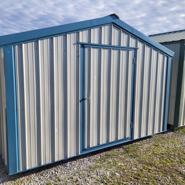 Metal storage shed with blue trim