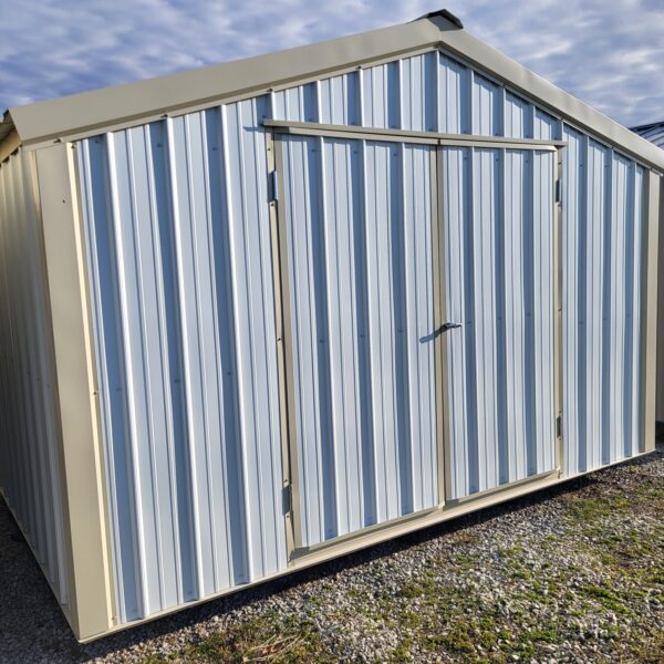 Metal storage shed with blue stripes